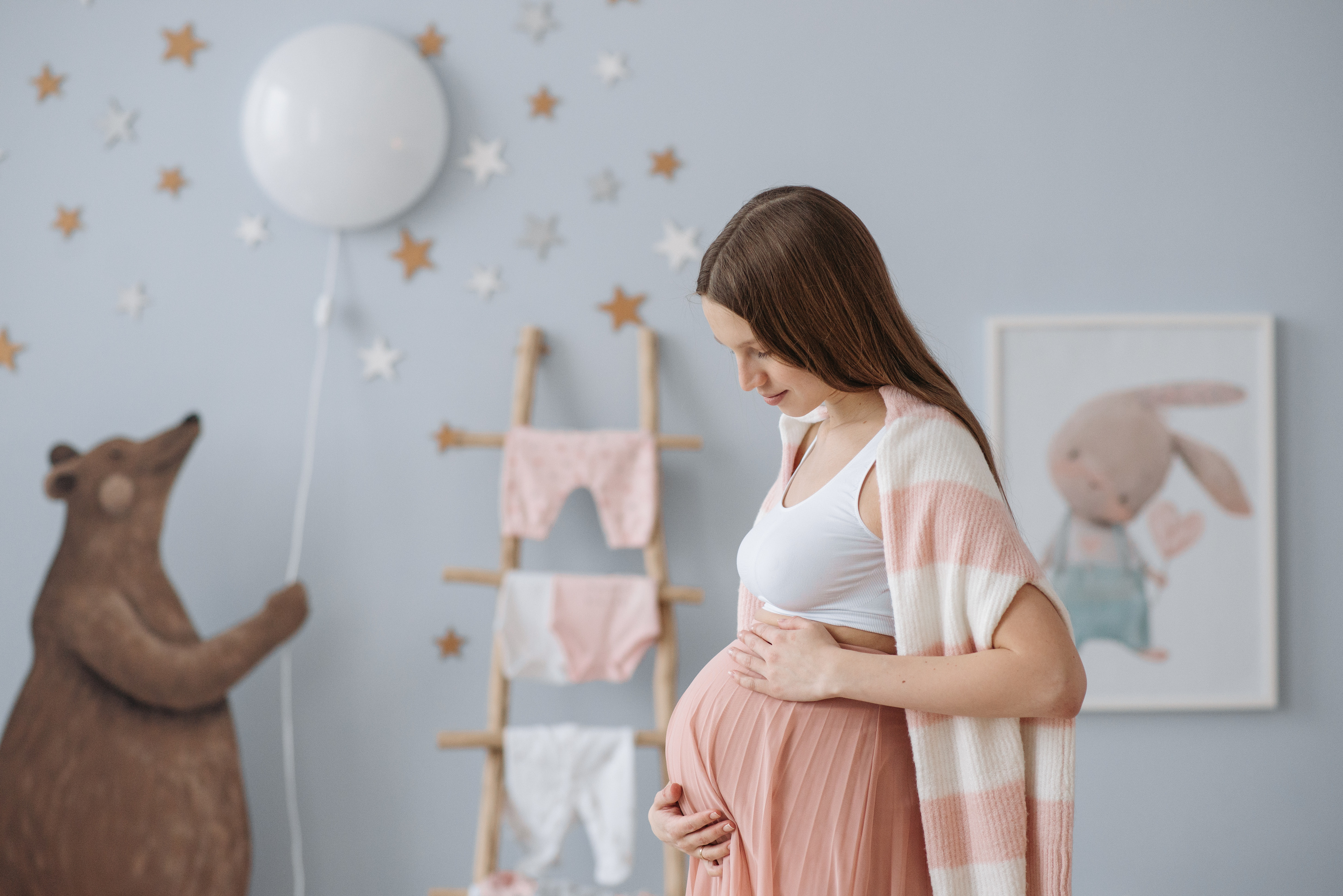 A Pregnant Woman Rubbing Her Belly